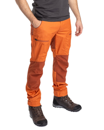 Burned Orange Terracotta Coloured Pinewood Mens Caribou TC Trousers on white background #colour_burned-orange-terracotta