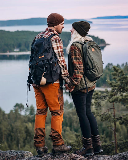 Nougat Fudge Coloured Pinewood Mens Caribou TC Trousers on lake background #colour_nougat-fudge