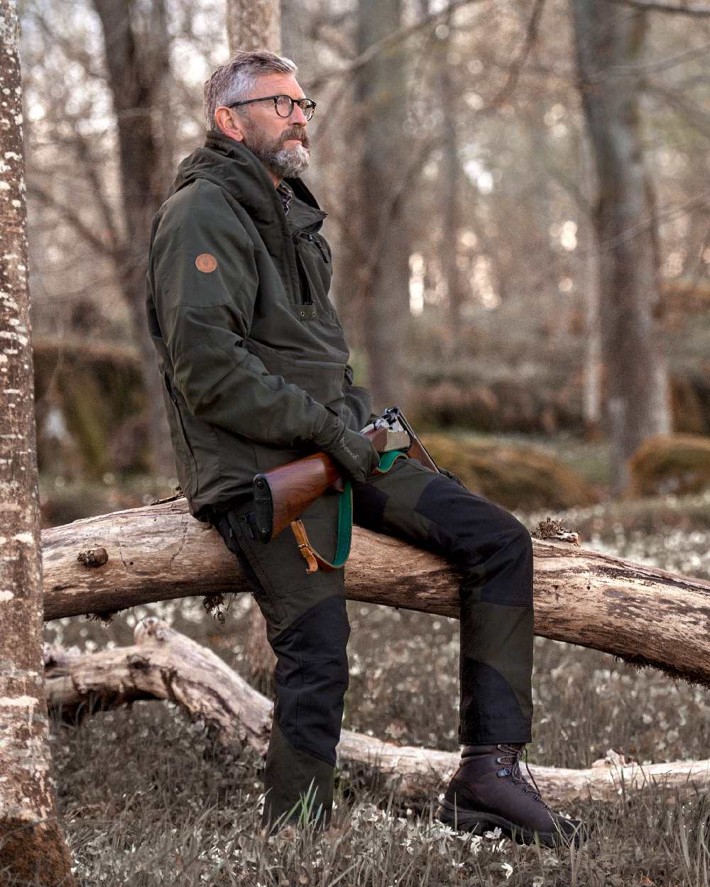 Moss Green Black Coloured Pinewood Mens Caribou Tc Extreme Trousers on forest background #colour_moss-green-black