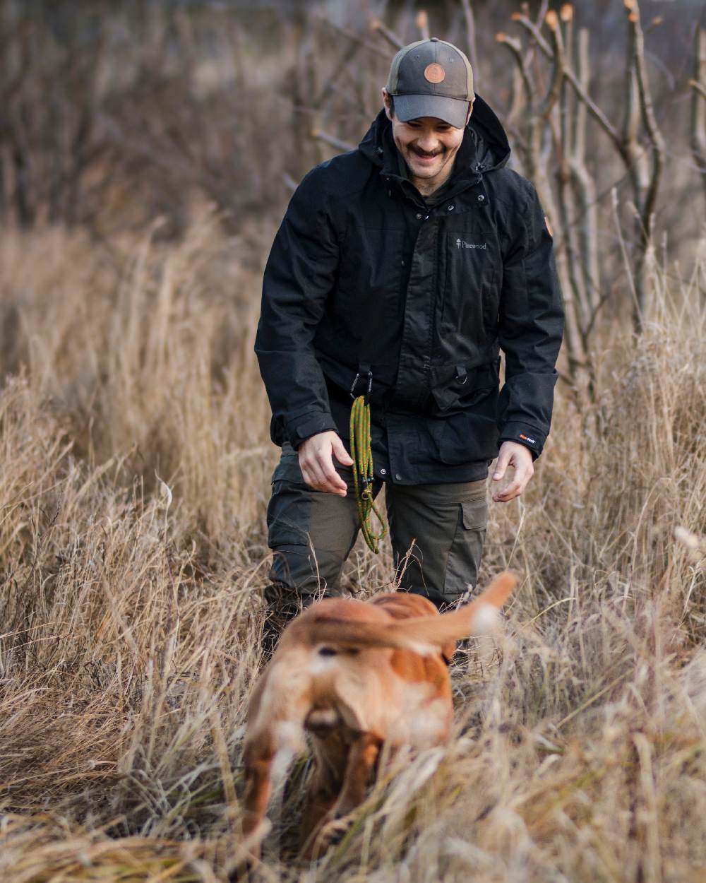 Black Coloured Pinewood Mens Dog Sports Trainer Extreme Jacket on outdoor background #colour_black