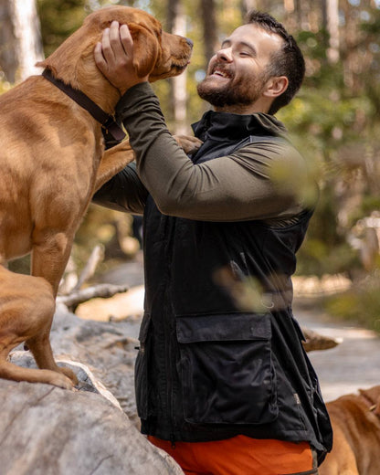 Black Coloured Pinewood Mens Dog Sports Trainer Vest on outdoor background #colour_black