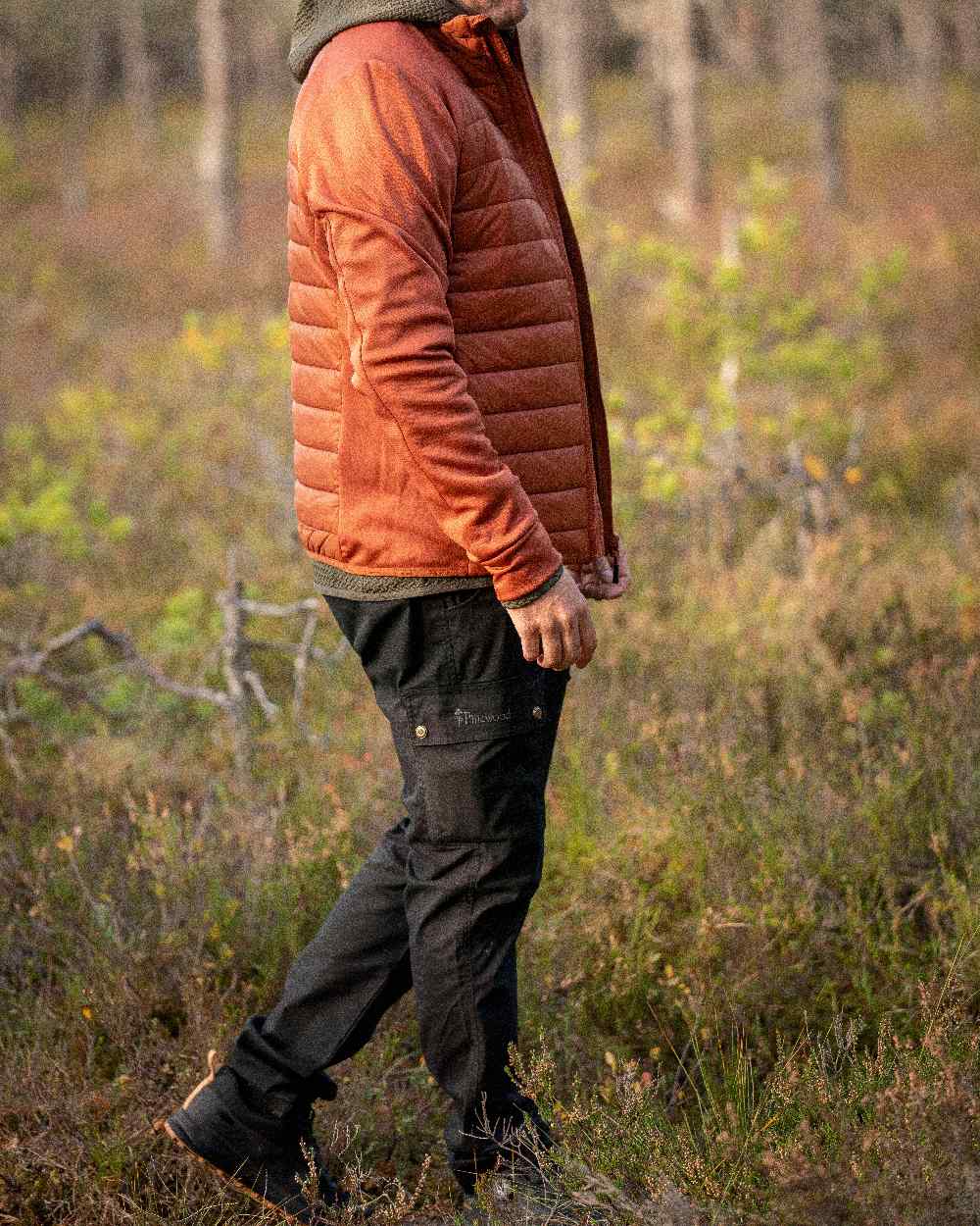 Black Coloured Pinewood Mens Finnveden Classic Trousers on outdoor background #colour_black
