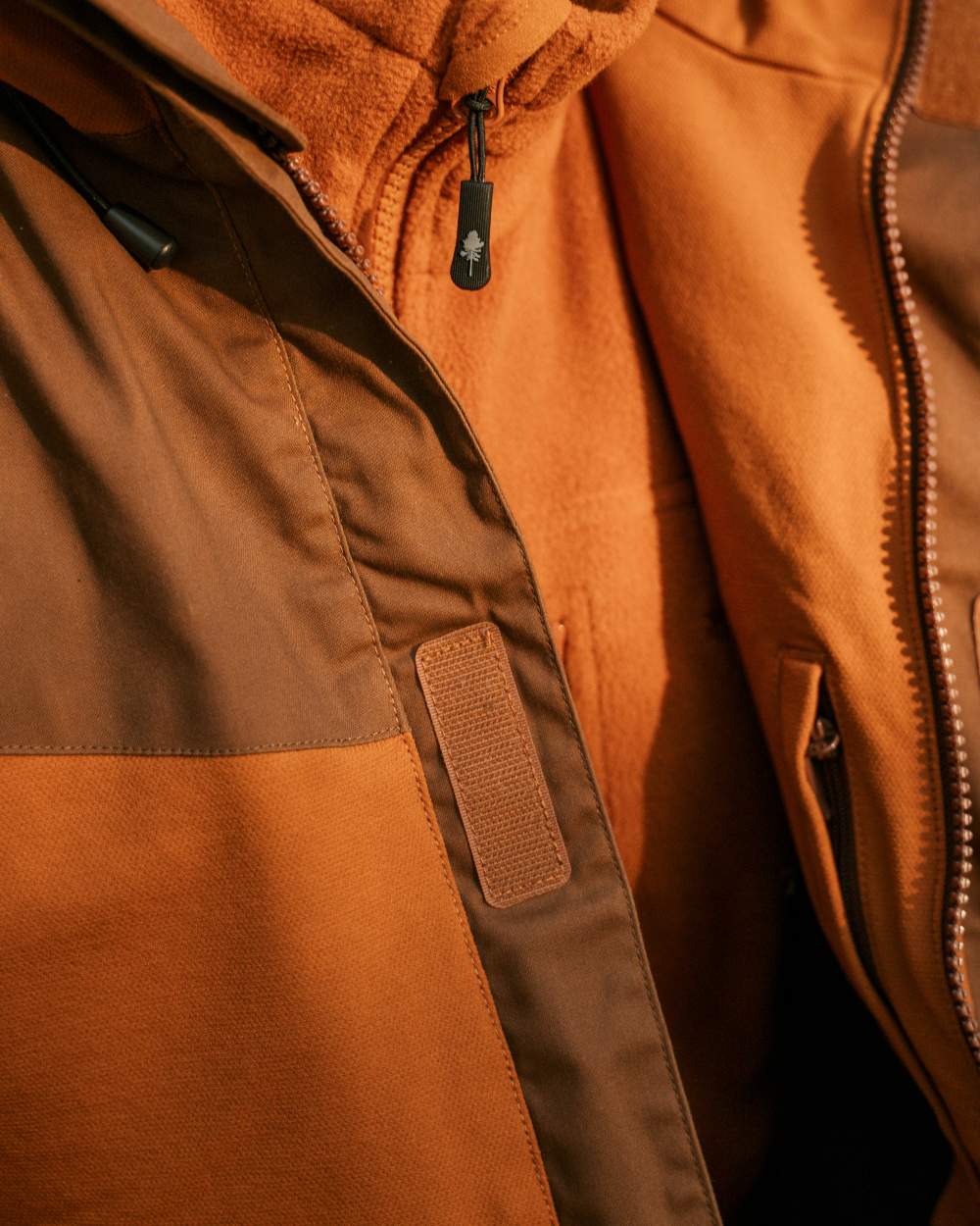 Fudge Nougat Coloured Pinewood Mens Finnveden Hybrid Extreme Jacket on white background #colour_fudge-nougat