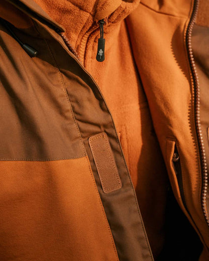 Fudge Nougat Coloured Pinewood Mens Finnveden Hybrid Extreme Jacket on white background #colour_fudge-nougat