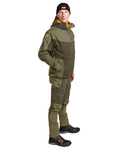 Dark Olive Hunting Olive Coloured Pinewood Mens Finnveden Hybrid Extreme Trousers on white background #colour_dark-olive-hunting-olive