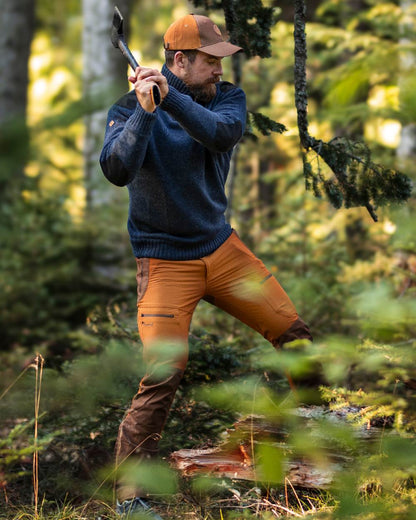 Fudge Nougat Coloured Pinewood Mens Finnveden Hybrid Trousers on outdoor background #colour_fudge-nougat