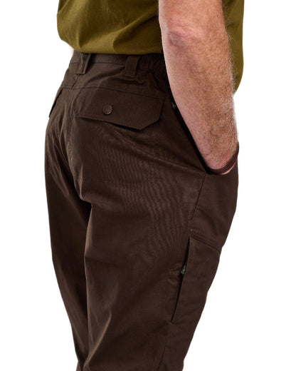 Dark Brown Coloured Pinewood Mens Finnveden Outdoor Trousers on white background #colour_dark-brown