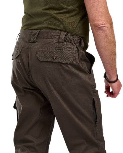 Dark Olive Coloured Pinewood Mens Finnveden Outdoor Trousers on white background #colour_dark-olive