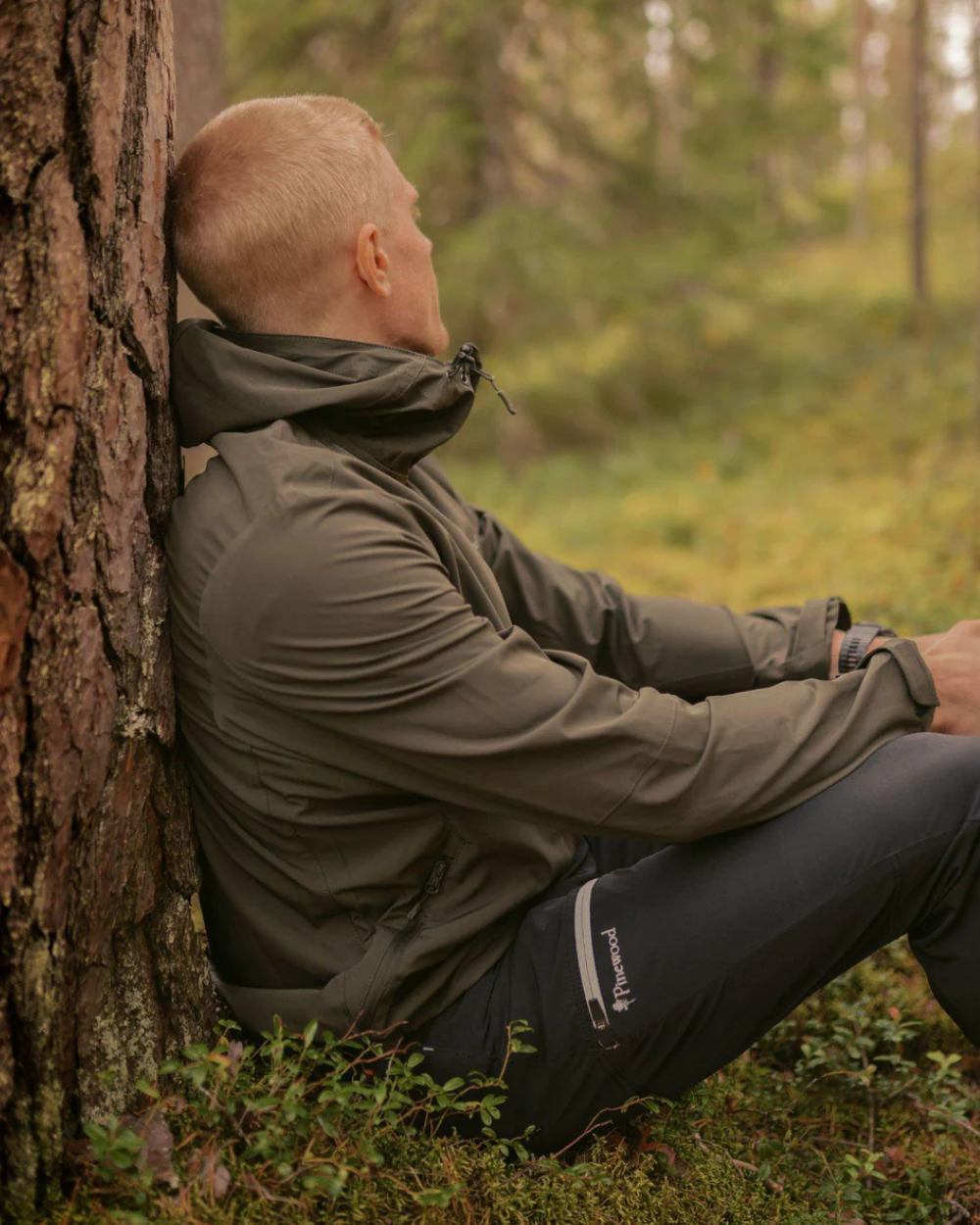 Black coloured Pinewood Mens Finnveden Trail Stretch Trousers on forest background #colour_black