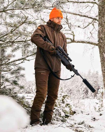 Suede Brown Dark Olive Coloured Pinewood Mens Furudal Caribou Hunt Extreme Jacket on snow background #colour_suede-brown-dark-olive
