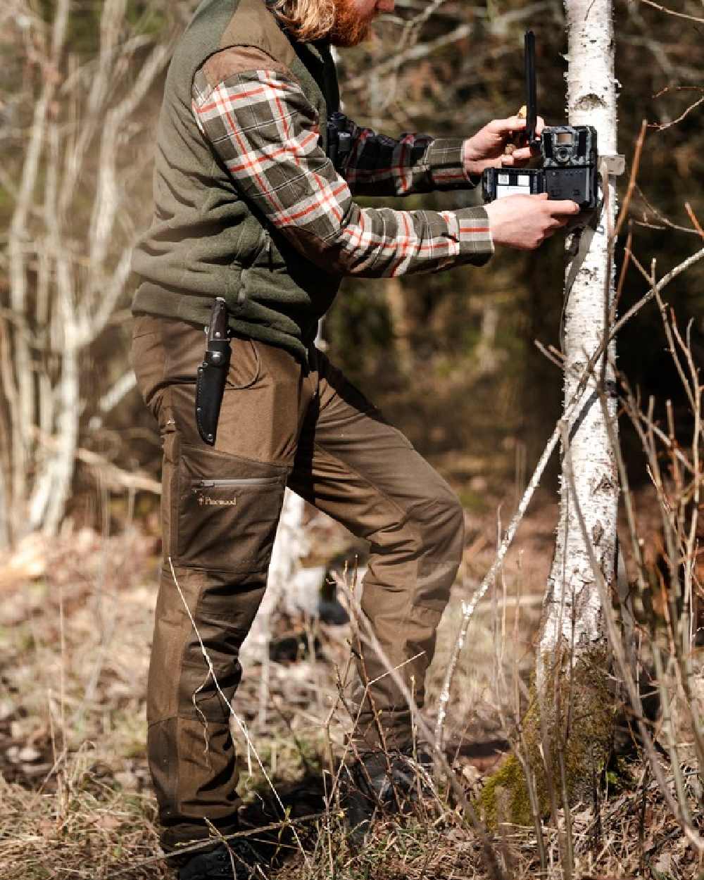 Hunting Brown Suede Brown Coloured Pinewood Mens Furudal Retriever Active Hunting Trousers on outdoor background #colour_hunting-brown-suede-brown