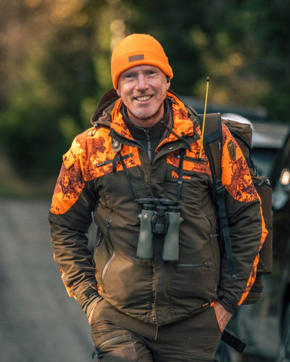 Mossgreen Strata Blaze Coloured Pinewood Mens Hunter Pro Xtreme 2.0 Camou Jacket on outdoor background #colour_mossgreen-strata-blaze