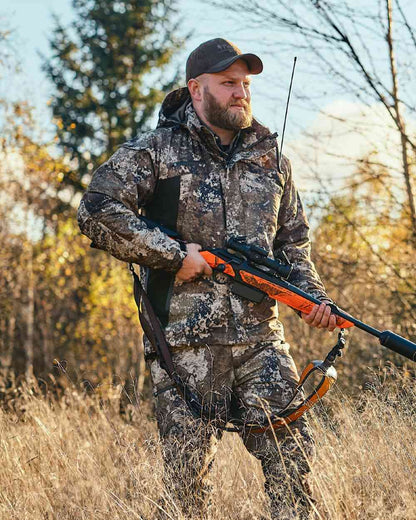 Strata Coloured Pinewood Mens Hunter Pro Xtreme 2.0 Camou Jacket on forest background #colour_strata