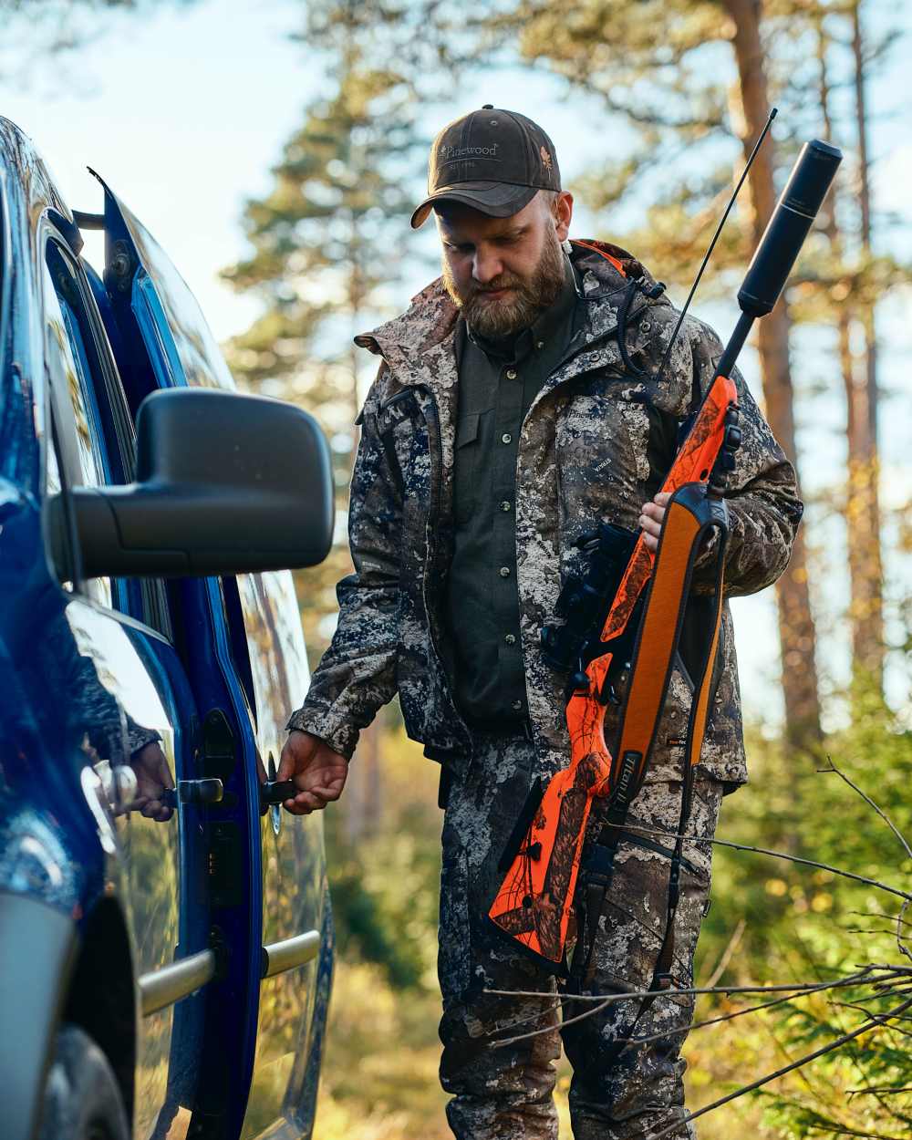 Strata Coloured Pinewood Mens Hunter Pro Xtreme 2.0 Camou Jacket on forest background #colour_strata