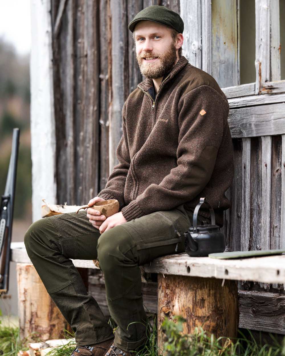 Dark Brown Mel Coloured Pinewood Mens Hurricane Full Zip Sweater on outdoor background #colour_dark-brown-mel