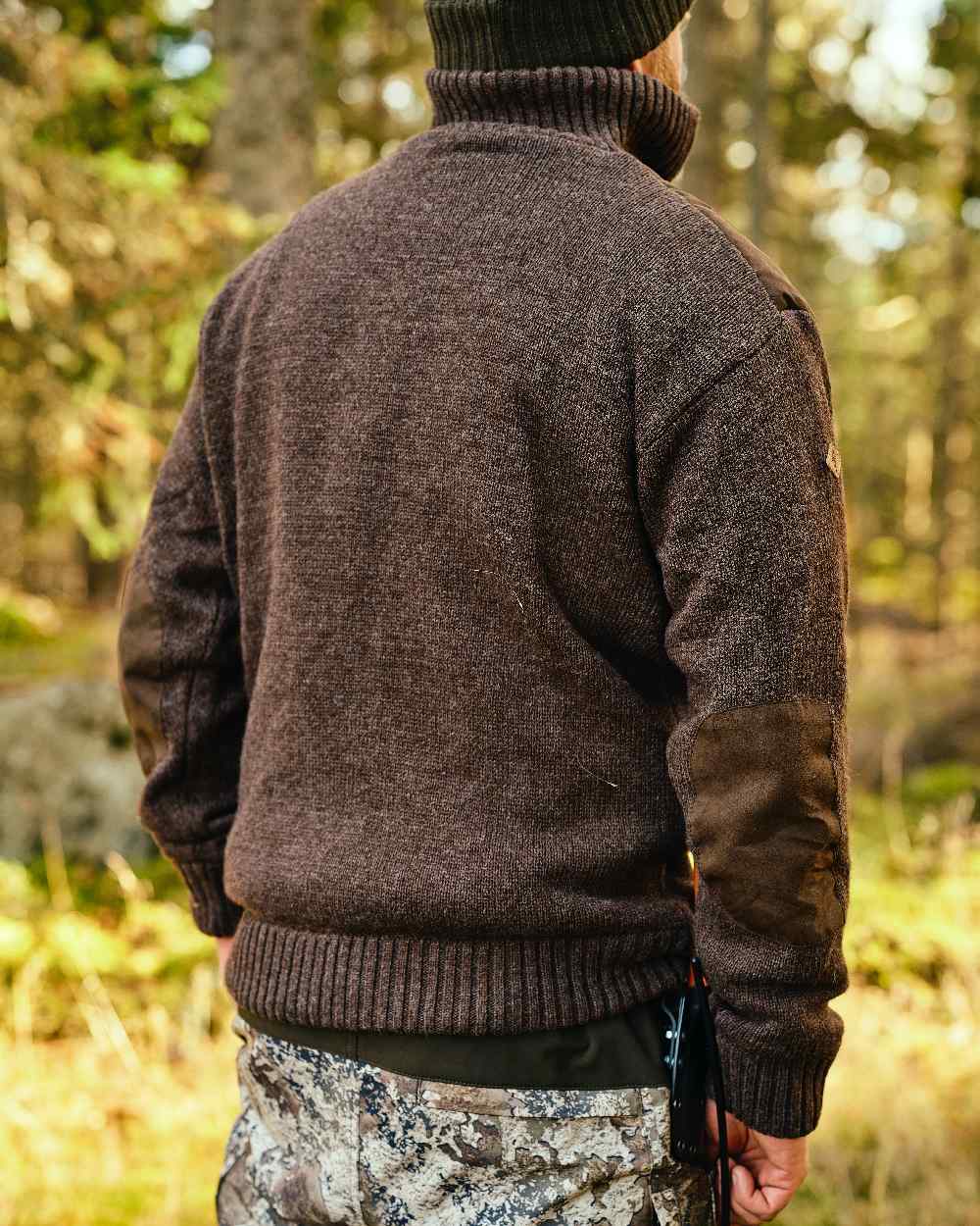Brown Mel Coloured Pinewood Mens Hurricane Sweater on outdoor background #colour_brown-mel