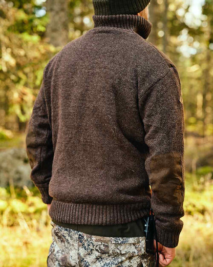 Brown Mel Coloured Pinewood Mens Hurricane Sweater on outdoor background #colour_brown-mel