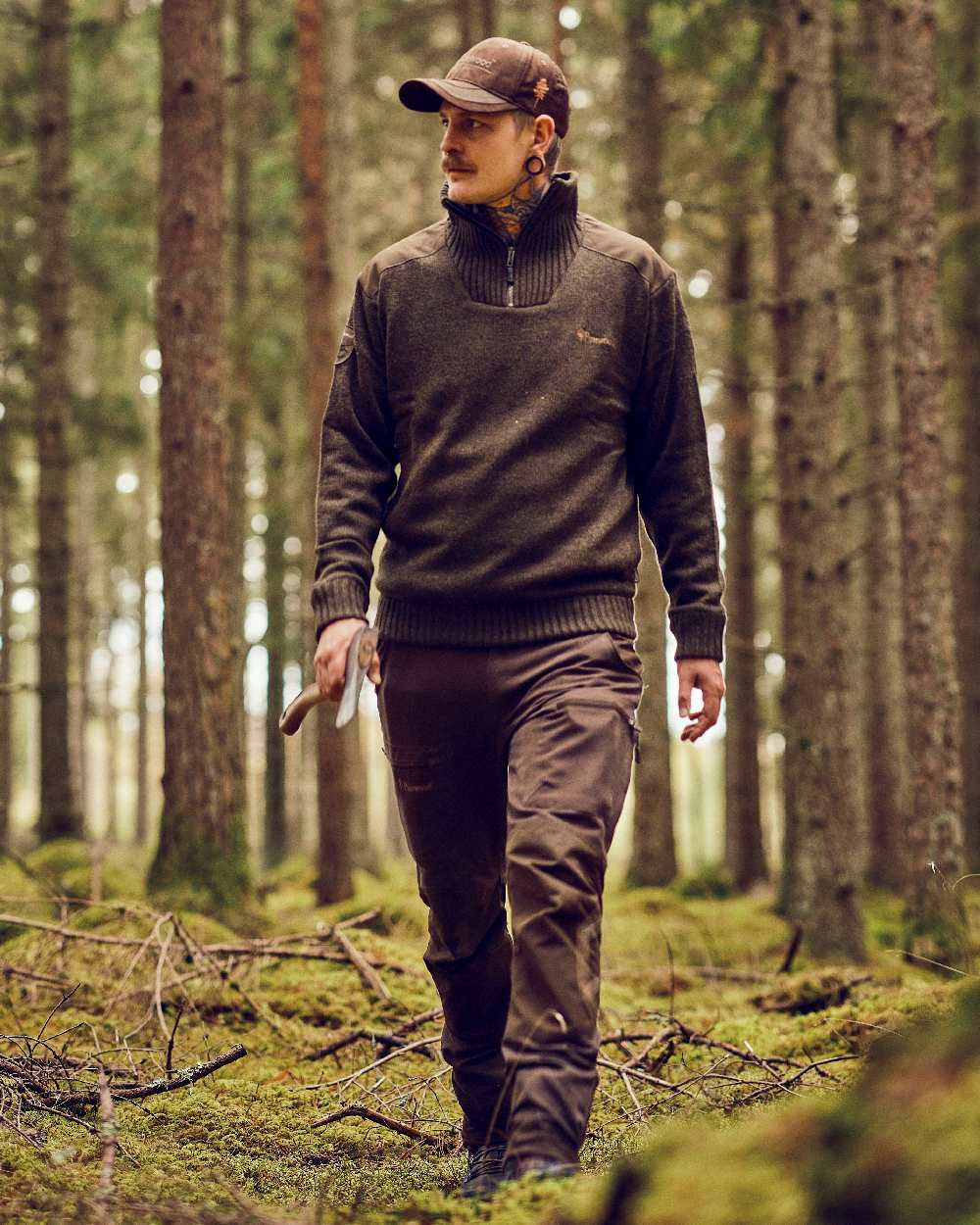 Dark Green Mel Coloured Pinewood Mens Hurricane Sweater on outdoor background #colour_dark-green-mel