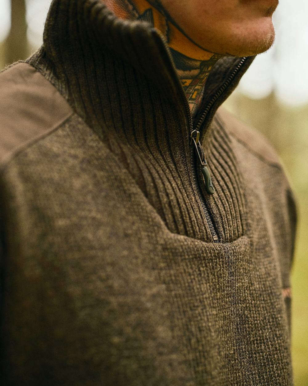 Dark Green Mel Coloured Pinewood Mens Hurricane Sweater on outdoor background #colour_dark-green-mel