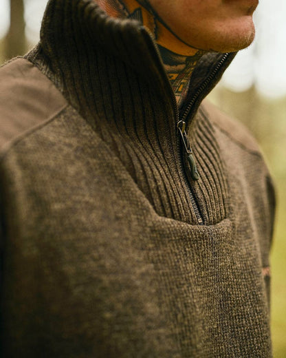 Dark Green Mel Coloured Pinewood Mens Hurricane Sweater on outdoor background #colour_dark-green-mel