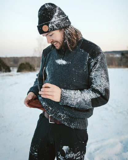 Dark Grey Mel Coloured Pinewood Mens Hurricane Sweater on outdoor background #colour_dark-grey-mel