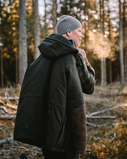 Mossgreen Suede Brown Coloured Pinewood Mens Nydala Insulation Wool Parka on outdoor background #colour_mossgreen-suede-brown