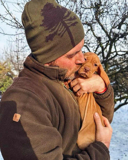 Dark Olive Suede Brown coloured Pinewood Mens Retriever Fleece Jacket on snow background #colour_dark-olive-suede-brown