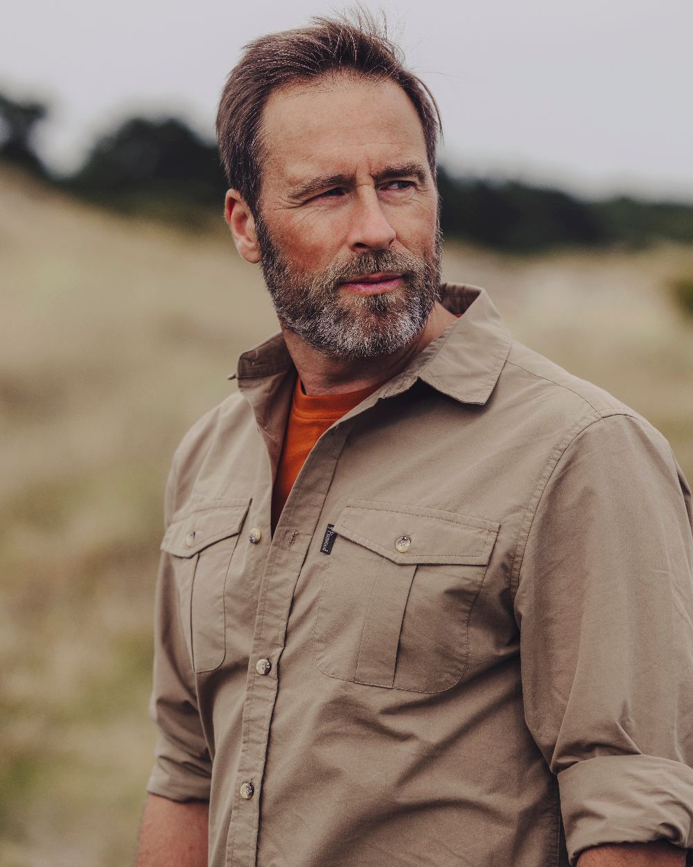 Sandstone Coloured Pinewood Mens Safari Long Sleeve Shirt on outdoor background #colour_sandstone