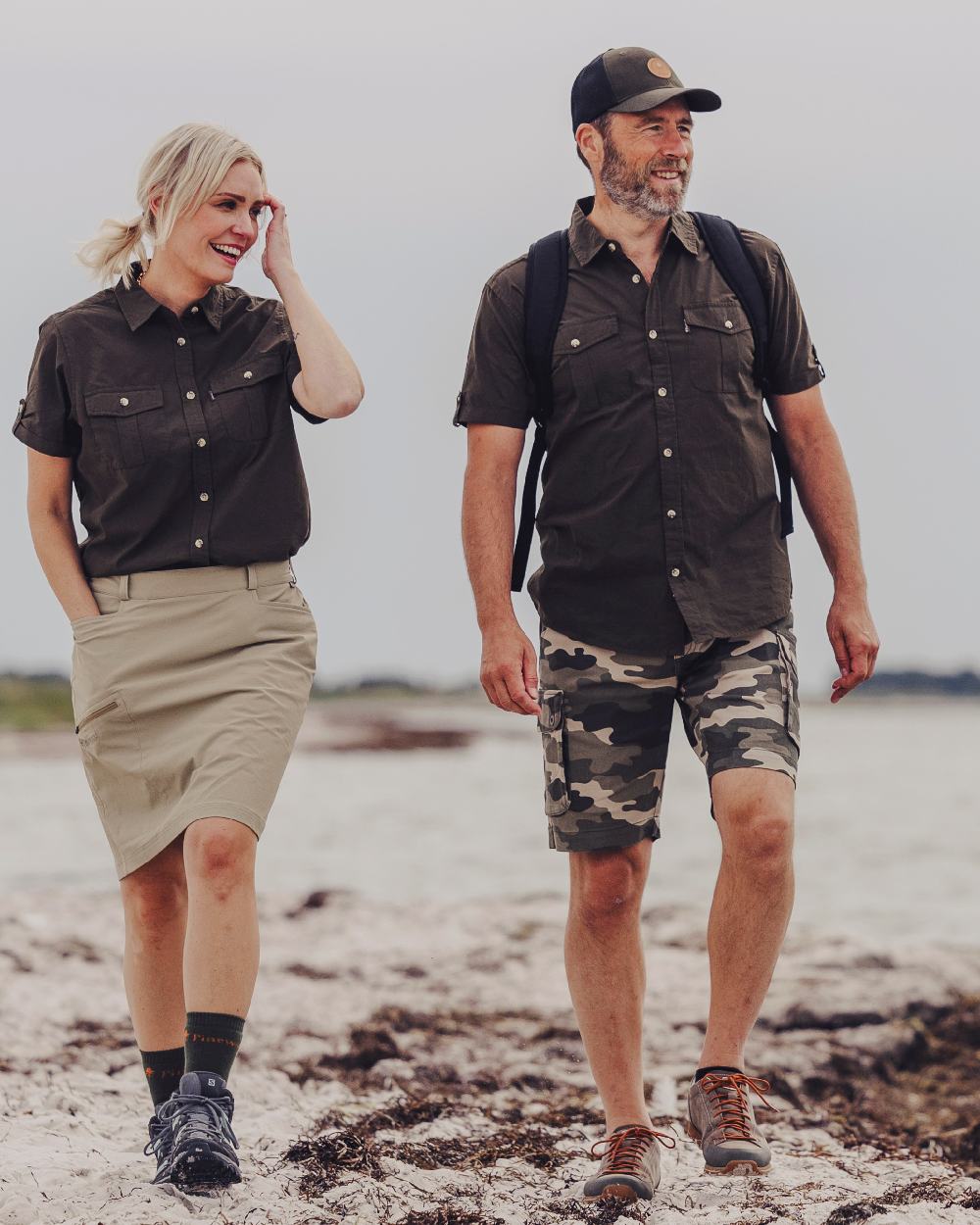 Dark Olive Coloured Pinewood Mens Safari Short Sleeve Shirt on outdoor background #colour_dark-olive