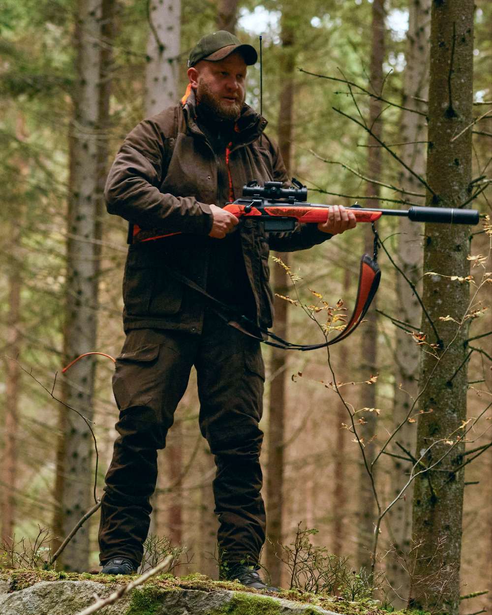 Suede Brown Coloured Pinewood Mens Smaland Hunters Jacket on forest background #colour_suede-brown