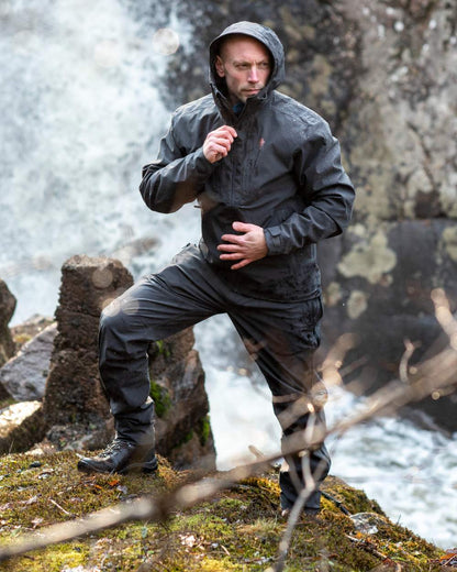 Dark Anthracite Coloured Pinewood Mens Telluz Trousers on forest background #colour_dark-anthracite