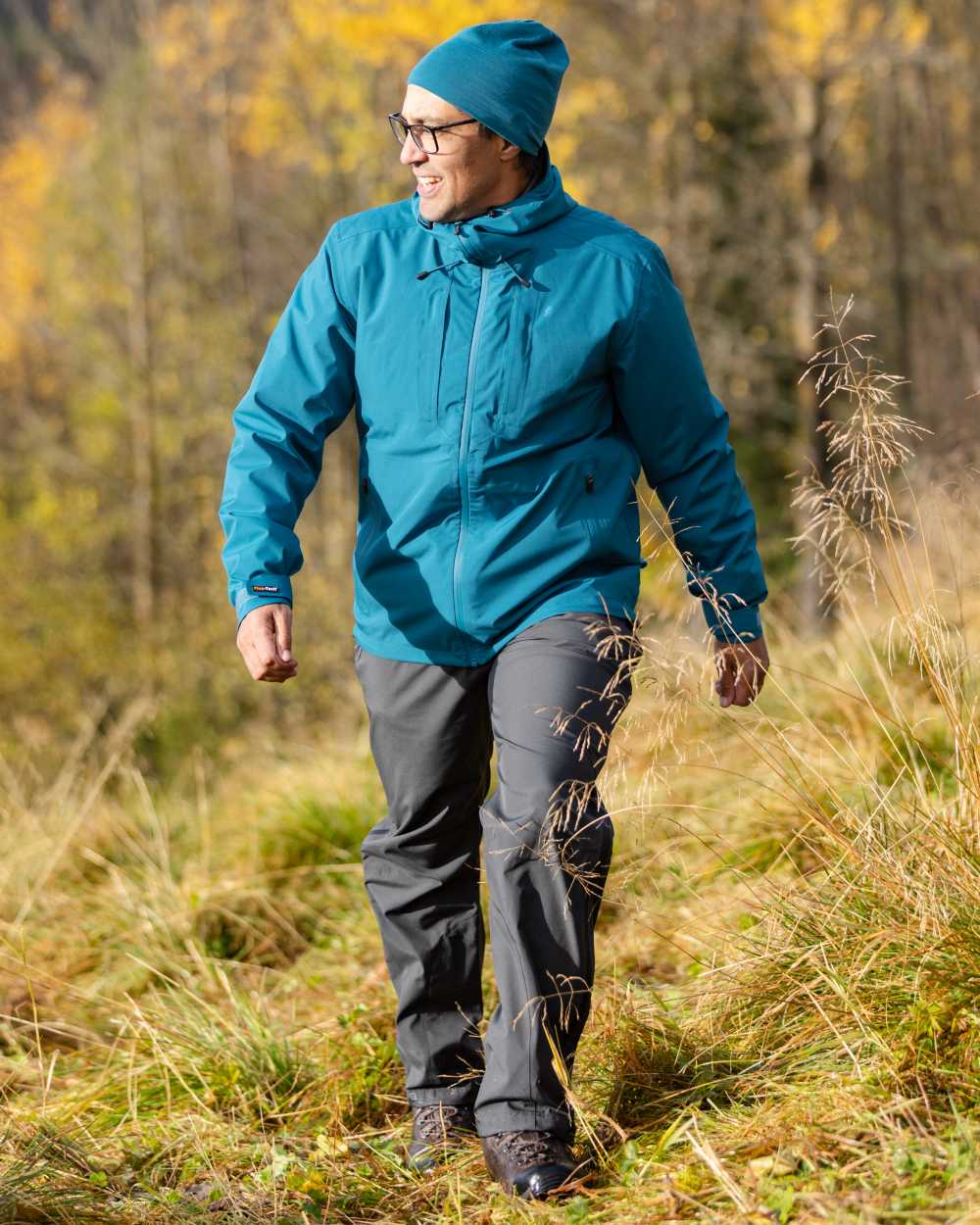 Dark Anthracite Coloured Pinewood Mens Telluz Trousers on forest background #colour_dark-anthracite