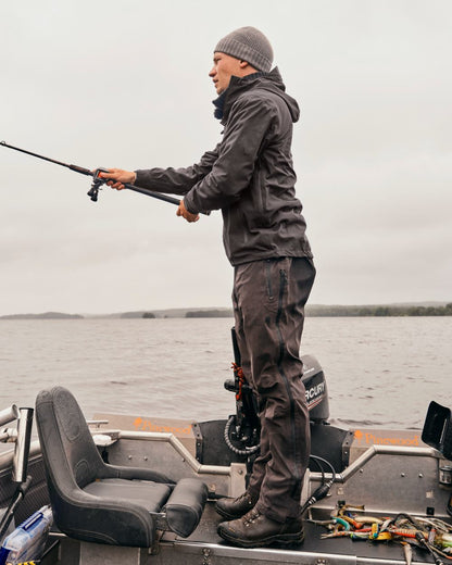 Dark Anthracite Coloured Pinewood Mens Telluz Trousers on forest background #colour_dark-anthracite