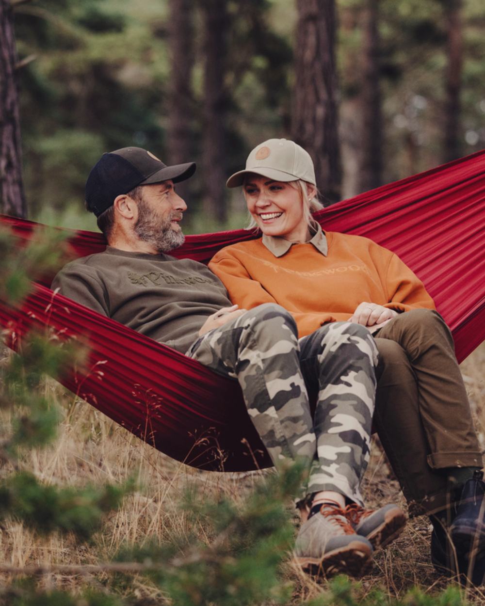 Khaki Camouflage Coloured Pinewood Mens Värnamo Serengeti Trousers on forest background #colour_khaki-camouflage
