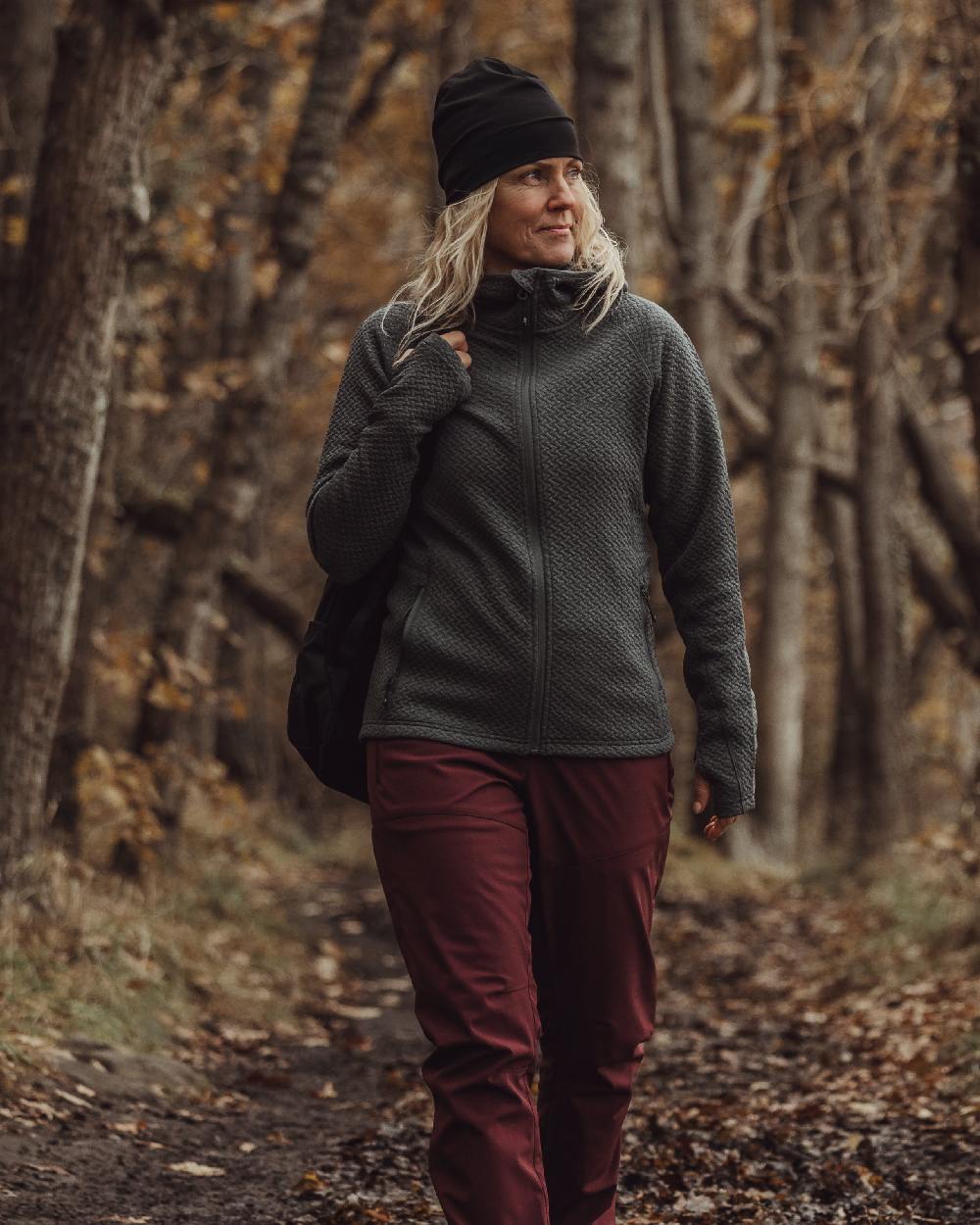 Black Coloured Pinewood Merino Wool Beanie on outdoor background #colour_black
