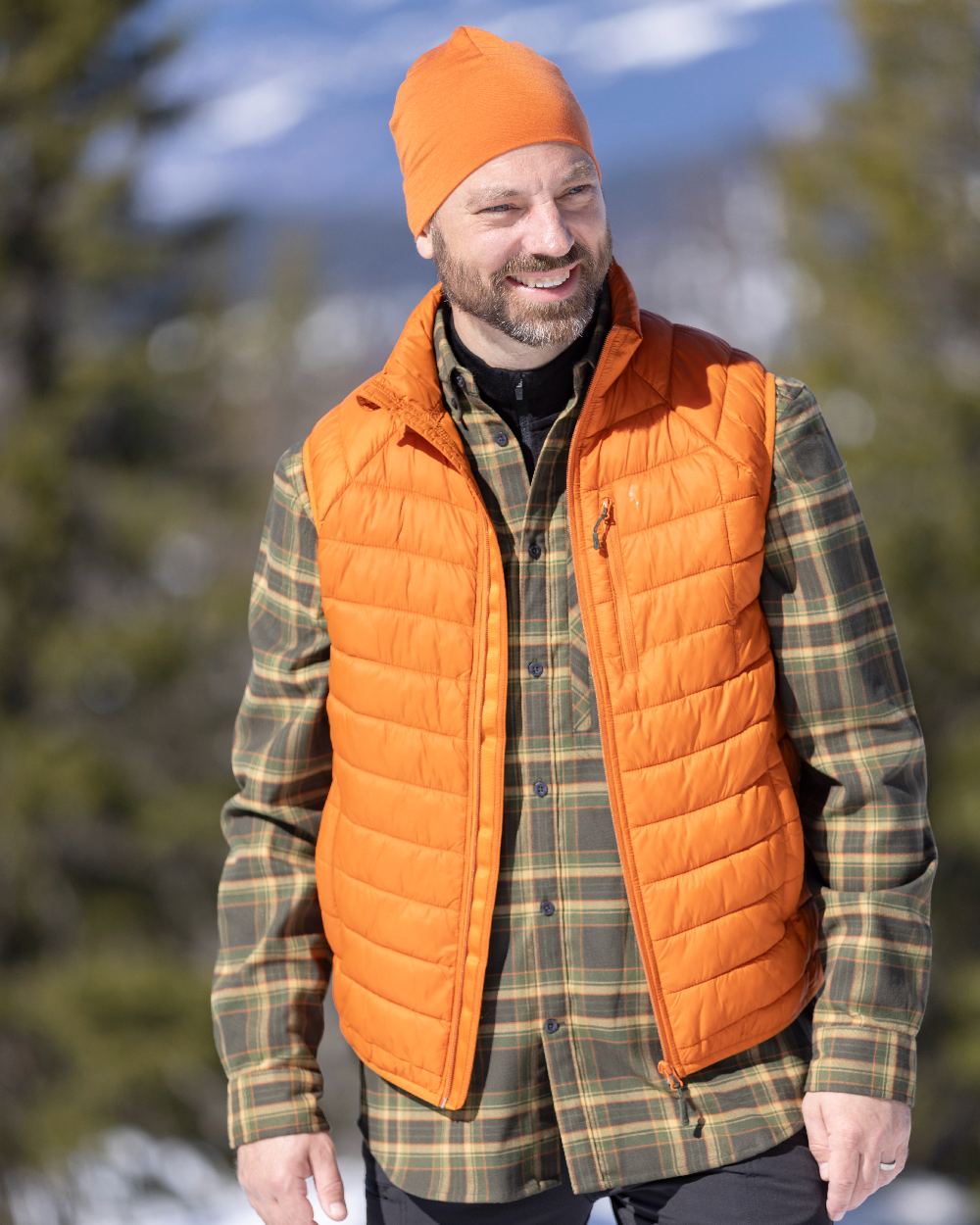 Burned Orange Coloured Pinewood Merino Wool Beanie on outdoor background #colour_burned-orange