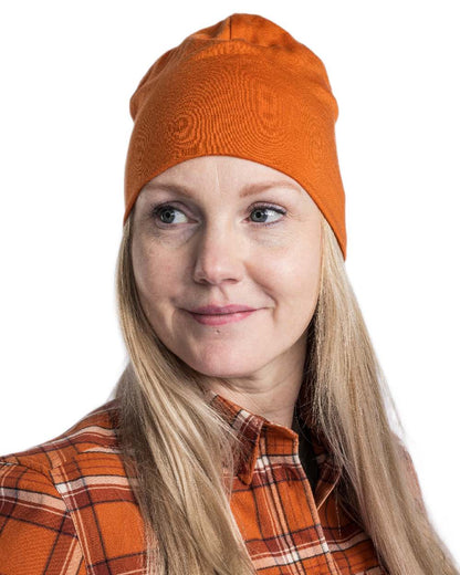 Burned Orange Coloured Pinewood Merino Wool Beanie on white background #colour_burned-orange