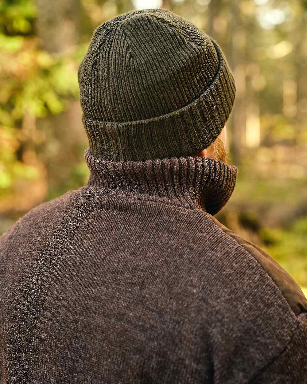 Moss Green Coloured Pinewood Windy Hat on outdoor background #colour_moss-green
