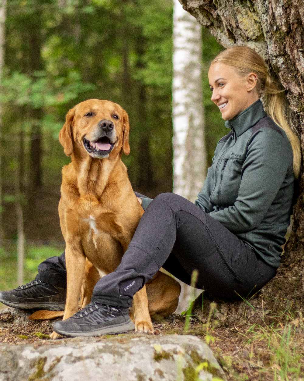 Black Coloured Pinewood Womens Abisko Adventure Trousers on outdoor background #colour_black