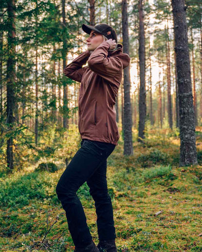 Black Coloured Pinewood Womens Abisko Brenton Trousers on outdoor background #colour_black