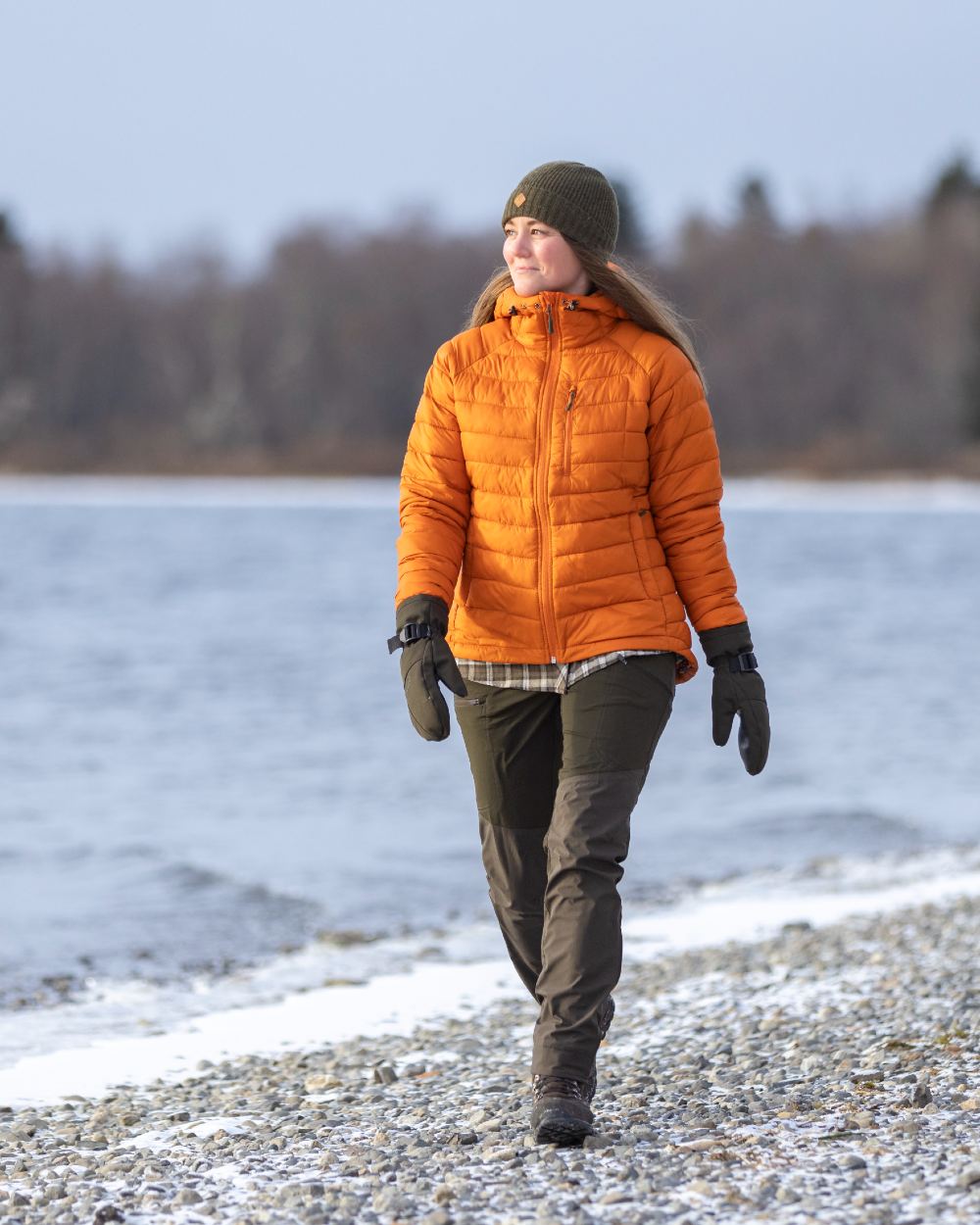 Dark Olive Suede Brown Coloured Pinewood Womens Abisko Brenton Trousers on snow background #colour_dark-olive-suede-brown