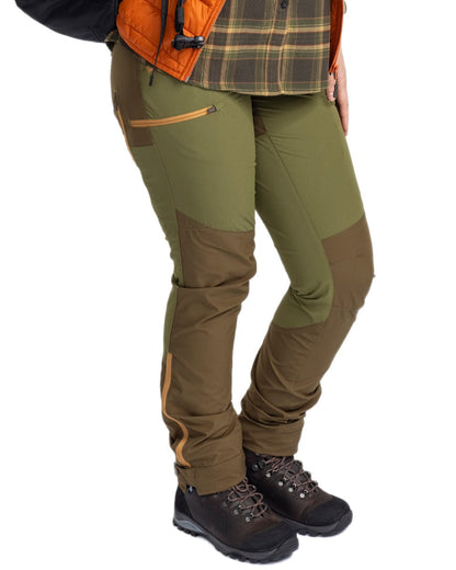 Leaf Hunting Olive Coloured Pinewood Womens Abisko Brenton Trousers on white background #colour_leaf-hunting-olive