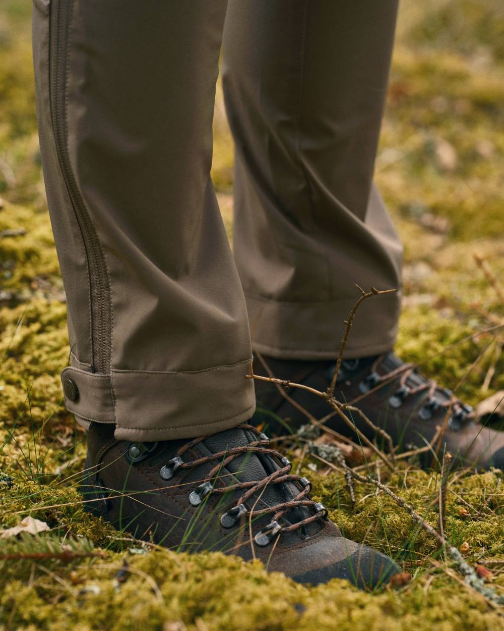 Mole Brown Coloured Pinewood Womens Abisko Brenton Trousers on forest background #colour_mole-brown