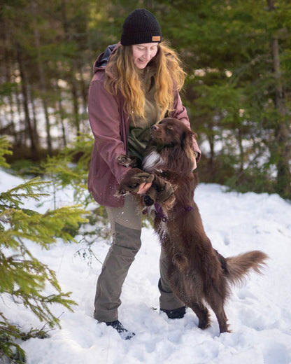Mole Brown Coloured Pinewood Womens Abisko Brenton Trousers on forest background #colour_mole-brown
