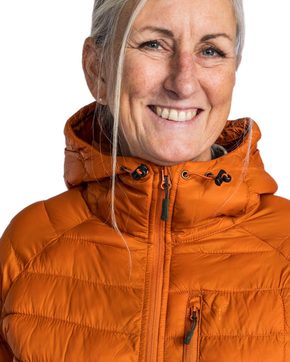 Burned Orange Coloured Pinewood Womens Abisko Insulation Jacket on white background #colour_burned-orange