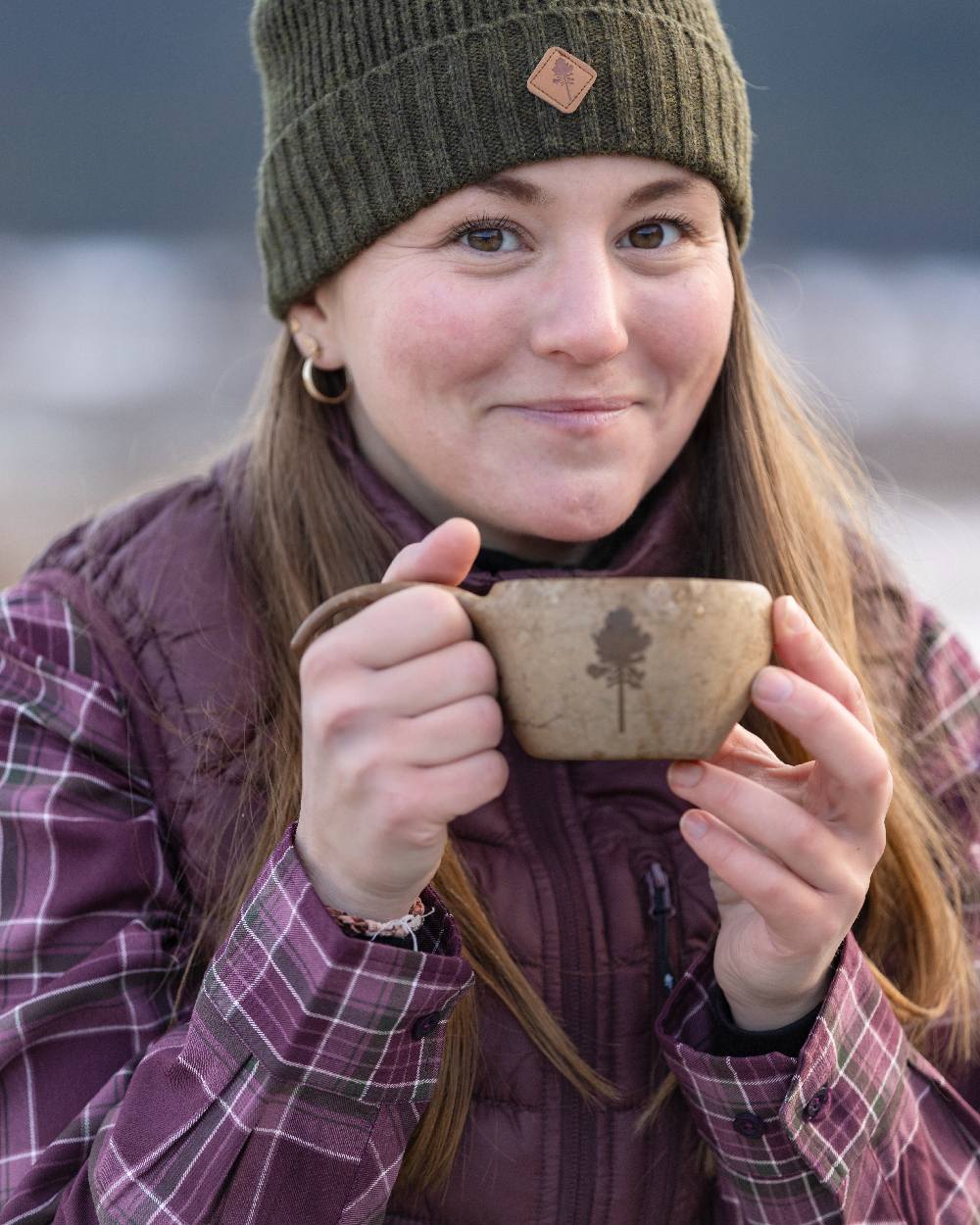 Earth Plum Coloured Pinewood Womens Abisko Insulation Vest on outdoor background #colour_earth-plum