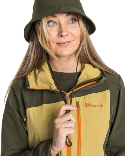 Golden Hay Mossgreen Coloured Pinewood Womens Abisko Light Stretch Jacket on white background #colour_golden-hay-mossgreen