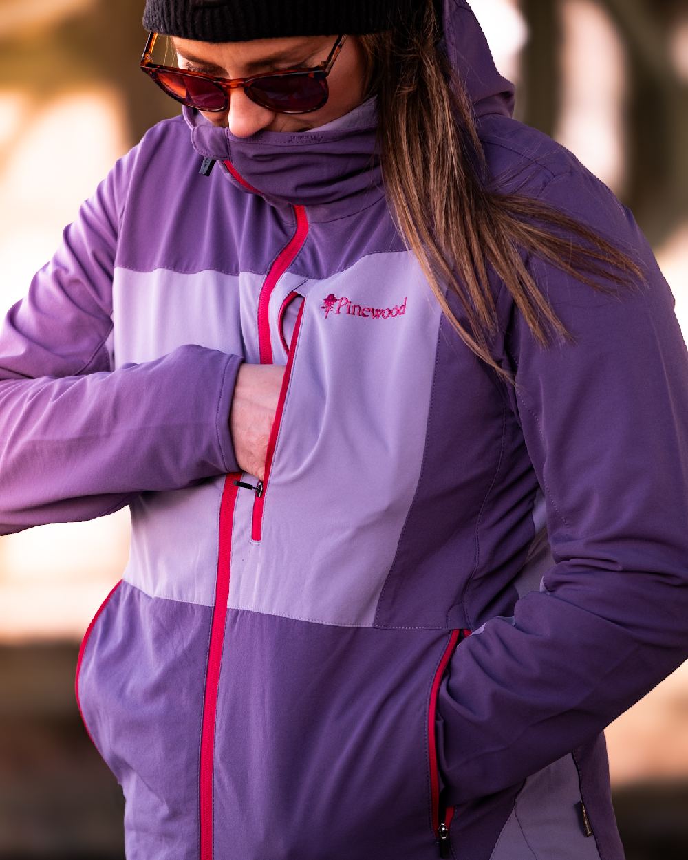 Light Lilac Coloured Pinewood Womens Abisko Light Stretch Jacket on outdoor background #colour_light-lilac
