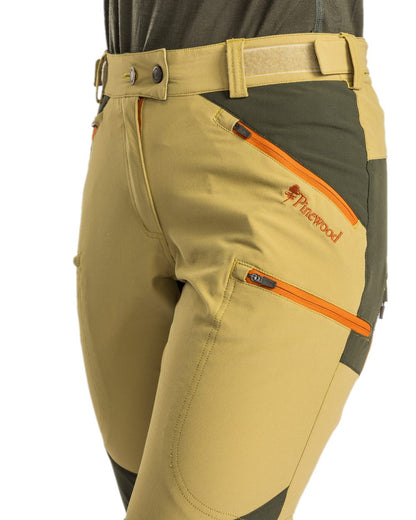 Golden Hay Mossgreen Coloured Pinewood Womens Abisko Light Stretch Trousers on white background #colour_golden-hay-mossgreen