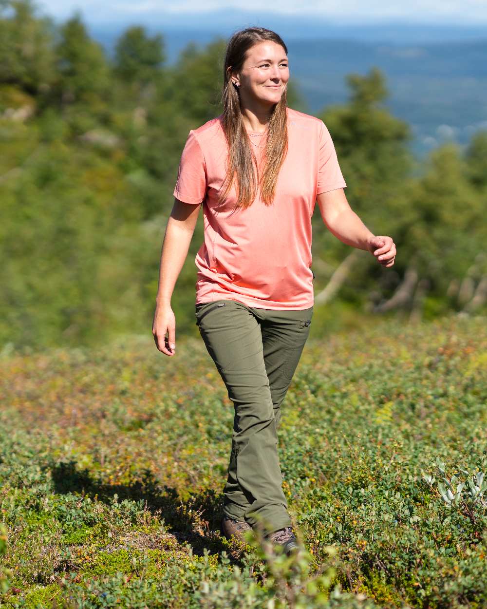 Mossgreen Coloured Pinewood Womens Abisko Light Stretch Trousers on outdoor background #colour_mossgreen